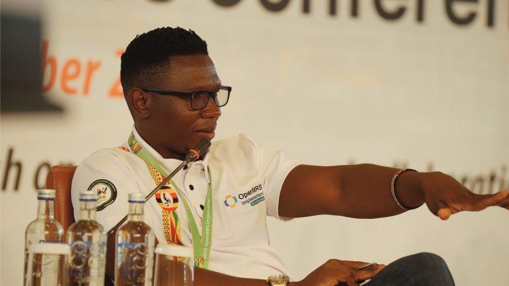 Kevin Oyowe, as a panelist during a pannel discussion session at the 2025 Global OpenMRS Implementers Conference